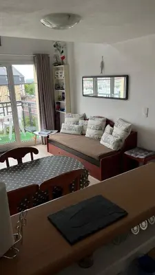 Coin salon dans l'établissement VILLA CATHY DUPLEX PLEIN SUD VUE PORT avec PISCINE INTERIEURE CHAUFFÉE