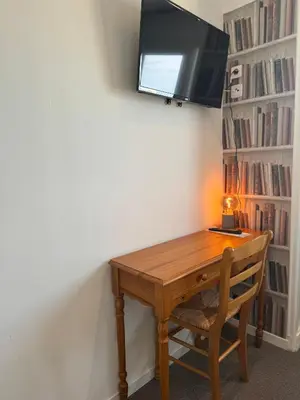 Télévision ou salle de divertissement dans l'établissement Le Clos Normand