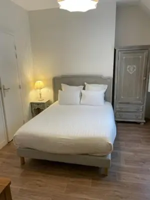 Un ou plusieurs lits dans un hébergement de l'établissement La Vieille Auberge