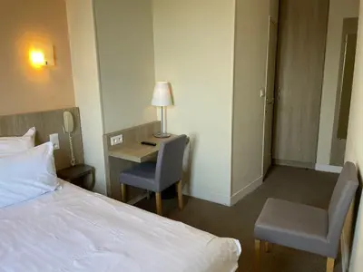 Un ou plusieurs lits dans un hébergement de l'établissement La Vieille Auberge