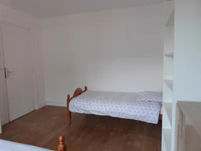 Un ou plusieurs lits dans un hébergement de l'établissement gîte iaorana - maison en centre ville