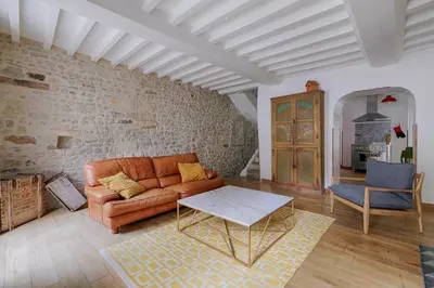 Coin salon dans l'établissement Maison de ville Bayeux
