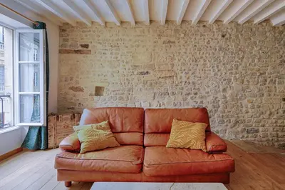 Coin salon dans l'établissement Maison de ville Bayeux