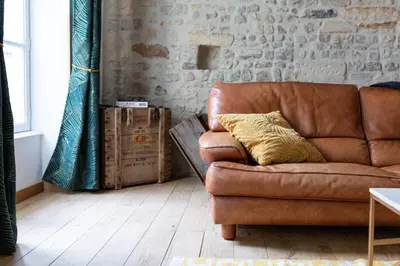Coin salon dans l'établissement Maison de ville Bayeux