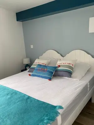 Un ou plusieurs lits dans un hébergement de l'établissement Maisonnette de la mer