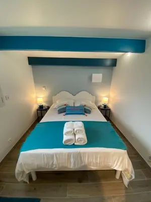 Un ou plusieurs lits dans un hébergement de l'établissement Maisonnette de la mer