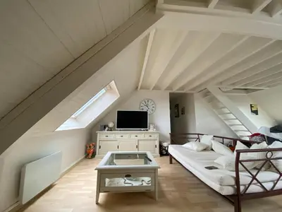 Télévision ou salle de divertissement dans l'établissement Appartement Vue Mer - Cabourg - Normandie
