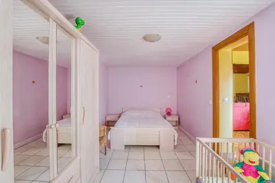 Un ou plusieurs lits dans un hébergement de l'établissement Marine - Maison et jardin - Grande Plage à 150 m