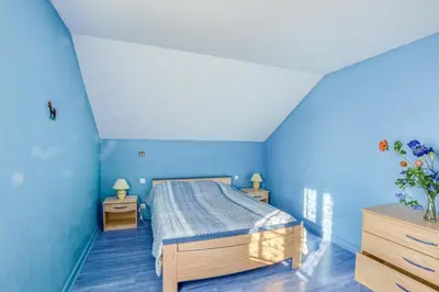Un ou plusieurs lits dans un hébergement de l'établissement Marine - Maison et jardin - Grande Plage à 150 m