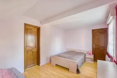 Un ou plusieurs lits dans un hébergement de l'établissement Marine - Maison et jardin - Grande Plage à 150 m