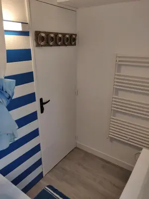 Un ou plusieurs lits dans un hébergement de l'établissement Appartement F3 Cabourg près plage hippodrome centre-ville