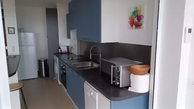 Cuisine ou kitchenette dans l'établissement 57 M2 LES PIEDS DANS l EAU Cabourg
