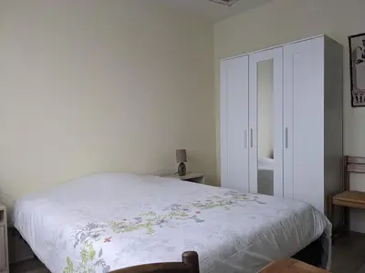 Un ou plusieurs lits dans un hébergement de l'établissement Maison centre de Barfleur