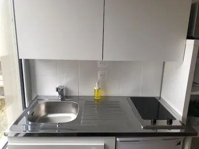 Cuisine ou kitchenette dans l'établissement HYPER CENTRE - WIFI FIBRE GRATUIT - JERGWELOH - Le Parisien
