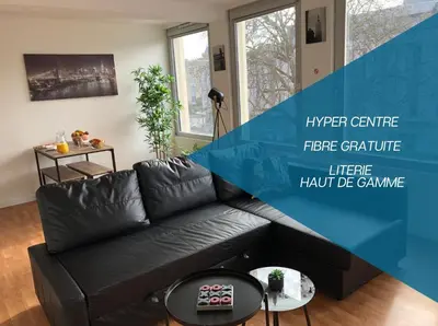 Coin salon dans l'établissement HYPER CENTRE - WIFI FIBRE GRATUIT - JERGWELOH - Le New Yorkais