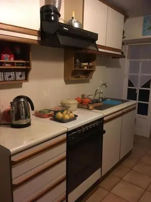 Cuisine ou kitchenette dans l'établissement La Chaumière