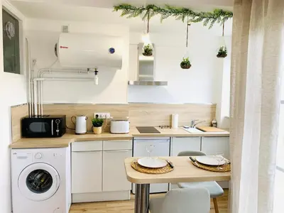 Cuisine ou kitchenette dans l'établissement Studio ScandiChic tout équipé centre-gare-rives-clinique à pied