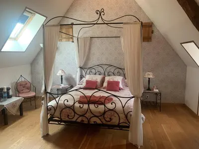 Un ou plusieurs lits dans un hébergement de l'établissement Le Clos des Tilleuls - D Day Home