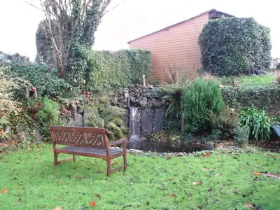 Jardin de l'établissement Le Clos des Tilleuls - D Day Home
