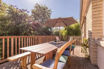 Balcon ou terrasse dans l'établissement La Maison Bleue au coeur des Plages du Débarquement