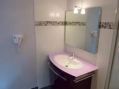 Salle de bains dans l'établissement Domaine De La Hurel