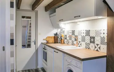 Cuisine ou kitchenette dans l'établissement Maison 4