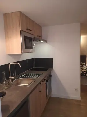 Cuisine ou kitchenette dans l'établissement Charmante Maison studio proche mer et commerces