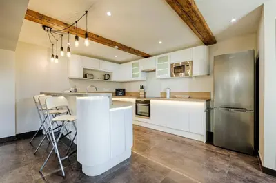 Cuisine ou kitchenette dans l'établissement Suite & Spa Maison de charmes avec Sauna & Hammam