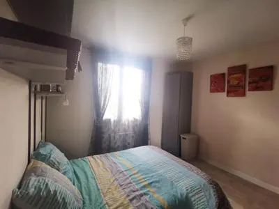 Un ou plusieurs lits dans un hébergement de l'établissement Maison de vacances 3 chambres à 400 m de la plage Kairon - Saint Pair sur mer