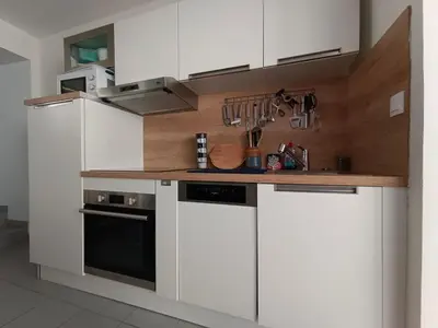 Cuisine ou kitchenette dans l'établissement La Patelle