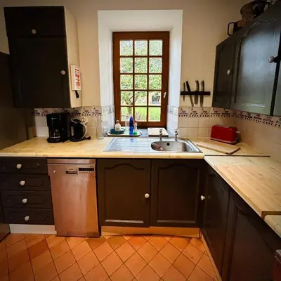 Cuisine ou kitchenette dans l'établissement CHATEAU DE MONFREVILLE