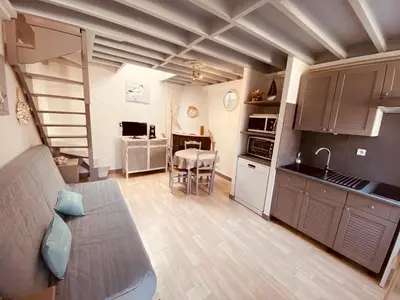 Cuisine ou kitchenette dans l'établissement La Cabourgeaise