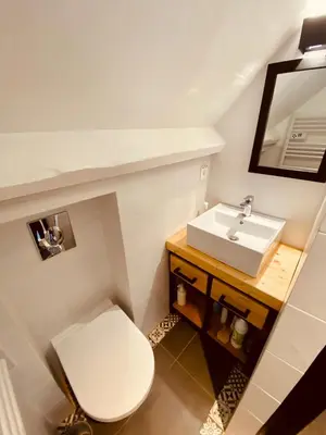 Salle de bains dans l'établissement La Cabourgeaise