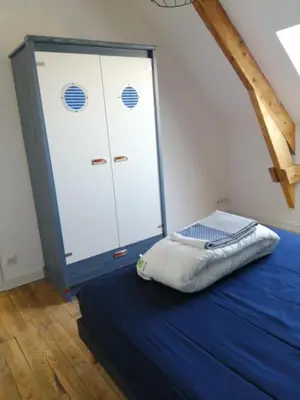 Un ou plusieurs lits dans un hébergement de l'établissement LE BELLEVUE 47 gîte touristique 3 étoiles
