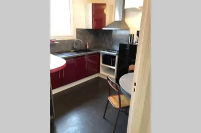 Cuisine ou kitchenette dans l'établissement Appartement Caen Hyper Centre