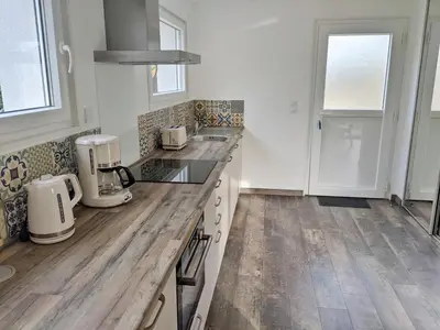 Cuisine ou kitchenette dans l'établissement Maison Blanche en Côte de Nacre