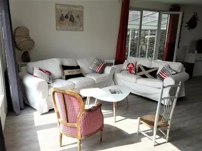 Coin salon dans l'établissement Agon-Coutainville, Villa spacieuse à 250m de la mer