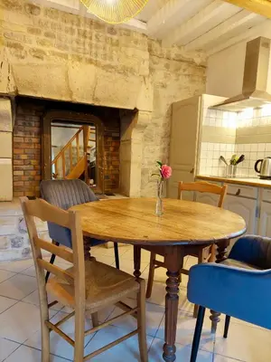 Coin salon dans l'établissement Maison 2 chambres avec espace extérieur privé et petit-déjeuner en supplément - fait-maison et produits locaux