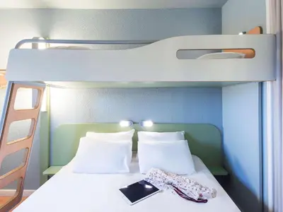 Un ou plusieurs lits dans un hébergement de l'établissement ibis budget Cabourg Dives sur Mer