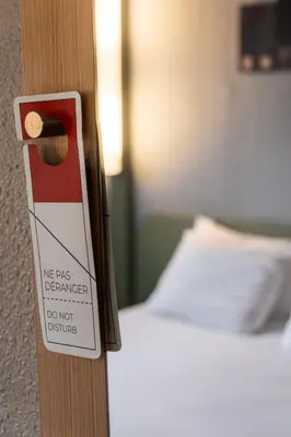 Un ou plusieurs lits dans un hébergement de l'établissement ibis budget Cabourg Dives sur Mer