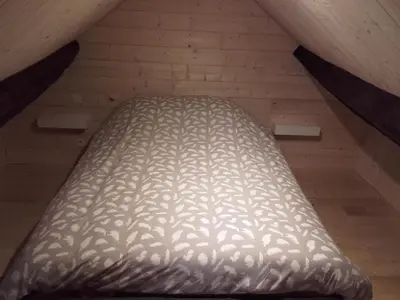 Un ou plusieurs lits dans un hébergement de l'établissement La Cahute, gîte étape