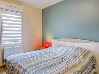 Un ou plusieurs lits dans un hébergement de l'établissement Apartment Les Hauts de Port Mer by Interhome