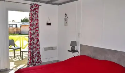 Un ou plusieurs lits dans un hébergement de l'établissement Camping Les Pommiers du Mont Saint Michel