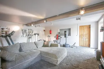 Coin salon dans l'établissement Gîte l'Ardoisier 7 Pers Sauna Bayeux 2km