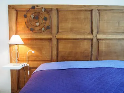 Un ou plusieurs lits dans un hébergement de l'établissement Maison Leonard