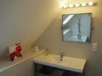 Salle de bains dans l'établissement Maison Leonard