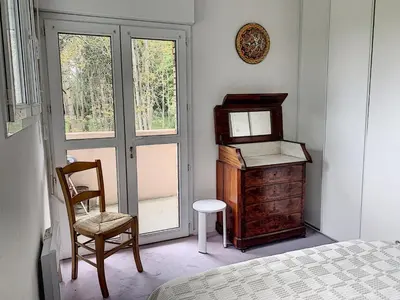 Un ou plusieurs lits dans un hébergement de l'établissement Duplex avec terrasse près de la plage et commerces - Saint-Pair-sur-Mer - FR-1-361-374