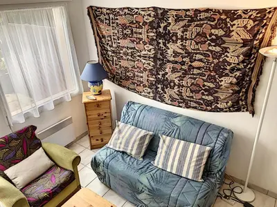 Coin salon dans l'établissement Duplex avec terrasse près de la plage et commerces - Saint-Pair-sur-Mer - FR-1-361-374