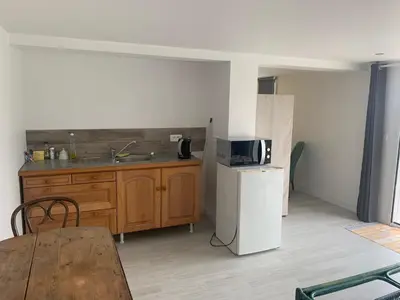 Cuisine ou kitchenette dans l'établissement suite junior OMAHA BEACH