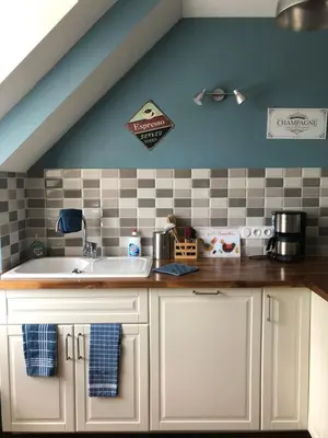 Cuisine ou kitchenette dans l'établissement Auprès de mon arbre